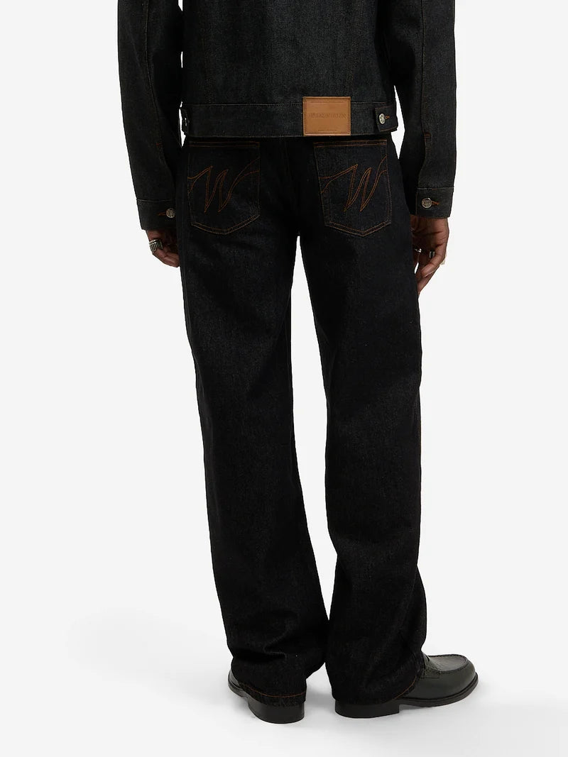 Le pantalon regular en denim brut